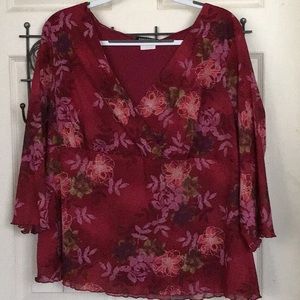 Red floral top.Ruffled sleeve and bottom.